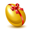 Golden egg with red bow