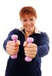 Woman holding dumbbells (dumbbells in focus)