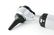 Otoscope over white background
