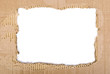 Corrugated cardboard sheet torn