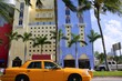 Yellow cab with Miami Beach Florida buildings Yellow cab with Miami Beach Florida buildings