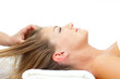 Attractive woman enjoying a head massage