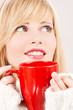 happy teenage girl with red mug