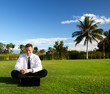 happy young businessman and sunset