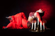 Belly dancer with burning candles