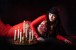 Belly dancer with burning candles
