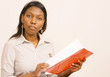 Young African woman with office file