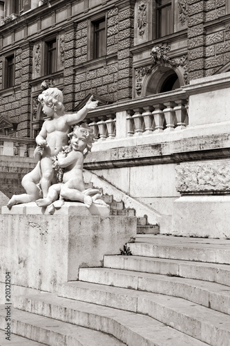 Photo: Hofburg Palace stairs and scultures in sepia, Vienna Hofburg Palace stairs and scultures in sepia, Vienna