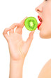 Woman's hand with kiwi Woman's hand with kiwi