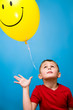 Photo: boy and balloon boy and balloon