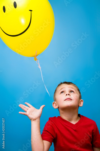 Photo: boy and balloon boy and balloon
