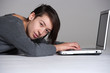 Young woman on floor with notebook