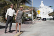 Photo: Couple hailing a cab Couple hailing a cab