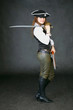 Beauty dressed as pirate on black with sword