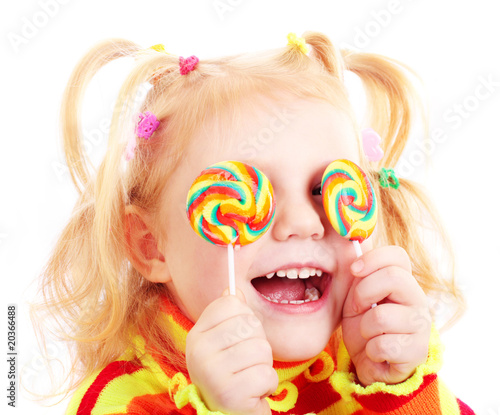 Photo: smile girl with candy isolated on white smile girl with candy isolated on white
