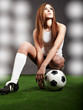 Sexy soccer player, woman on playing field