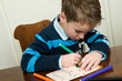 Photo: Writing And Drawing Boy Writing And Drawing Boy