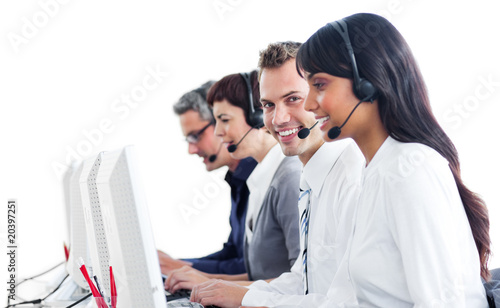 Photo: Smiling customer service representatives with headset on Smiling customer service representatives with headset on