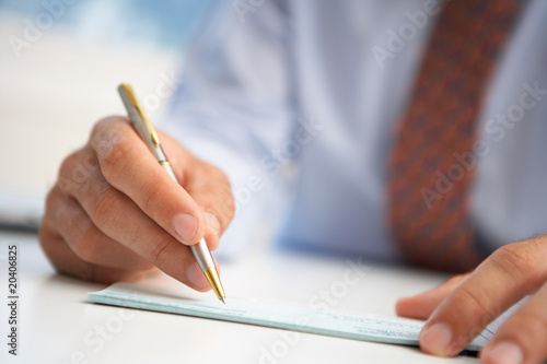 Photo: check signing check signing