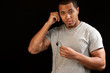 Black athlete listening to music on ipod
