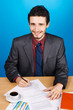 Young handsome businessman working with documents Young handsome businessman working with documents