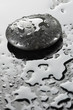 spa stone with water drops