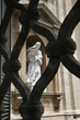 Statue of Saint Teresa of Avila Viewed Through Fence