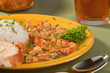 Plate of delicious thick cajun crawfish etouffee with rice Plate of delicious thick cajun crawfish etouffee with rice