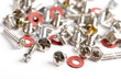 Screws, bolts and nuts on a white background.