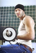 handsome man makes exercises