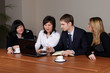 Command of businessmen at office