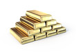 Gold bars on white surface Gold bars on white surface