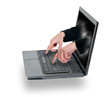 Hacker's hands are coming through laptop display