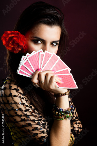 Photo: Gypsy woman with fan of cards Gypsy woman with fan of cards