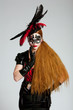 Long haired woman in mask