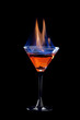 Flaming cocktail over black Flaming cocktail over black