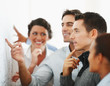 Business people looking at a chart put on the wall