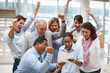 Business team celebrating over finalization of a contract