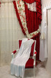 Luxurious window curtains with chair