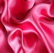 Smooth elegant red silk as background Smooth elegant red silk as background