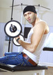 handsome man takes exercises