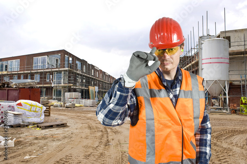 Photo: Saluting construction worker Saluting construction worker