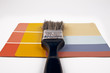 paint brush on top of layers of color paint brush on top of layers of color