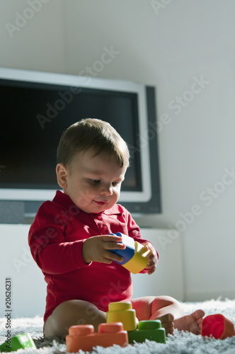 Photo: Baby boy playing with toys Baby boy playing with toys