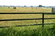 Meadow grasslands farm round bales in Texas Meadow grasslands farm round bales in Texas
