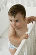 Baby boy in crib