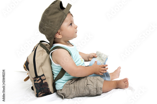 Photo: Baby boy with backpack and map Baby boy with backpack and map
