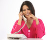 Modern girl in pink dress with telephone receiver