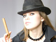 nice lady in a cap and with a cigarette