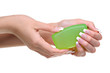 Woman hands hold the green soap Woman hands hold the green soap